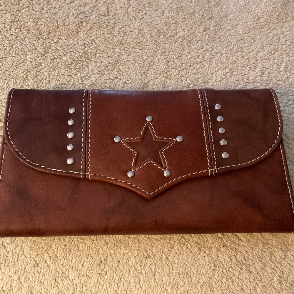 Trenditions’ Brown Leather Wallet with a Star Cutout and Silver Studs